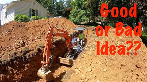 digging deep trenches with kubota mini